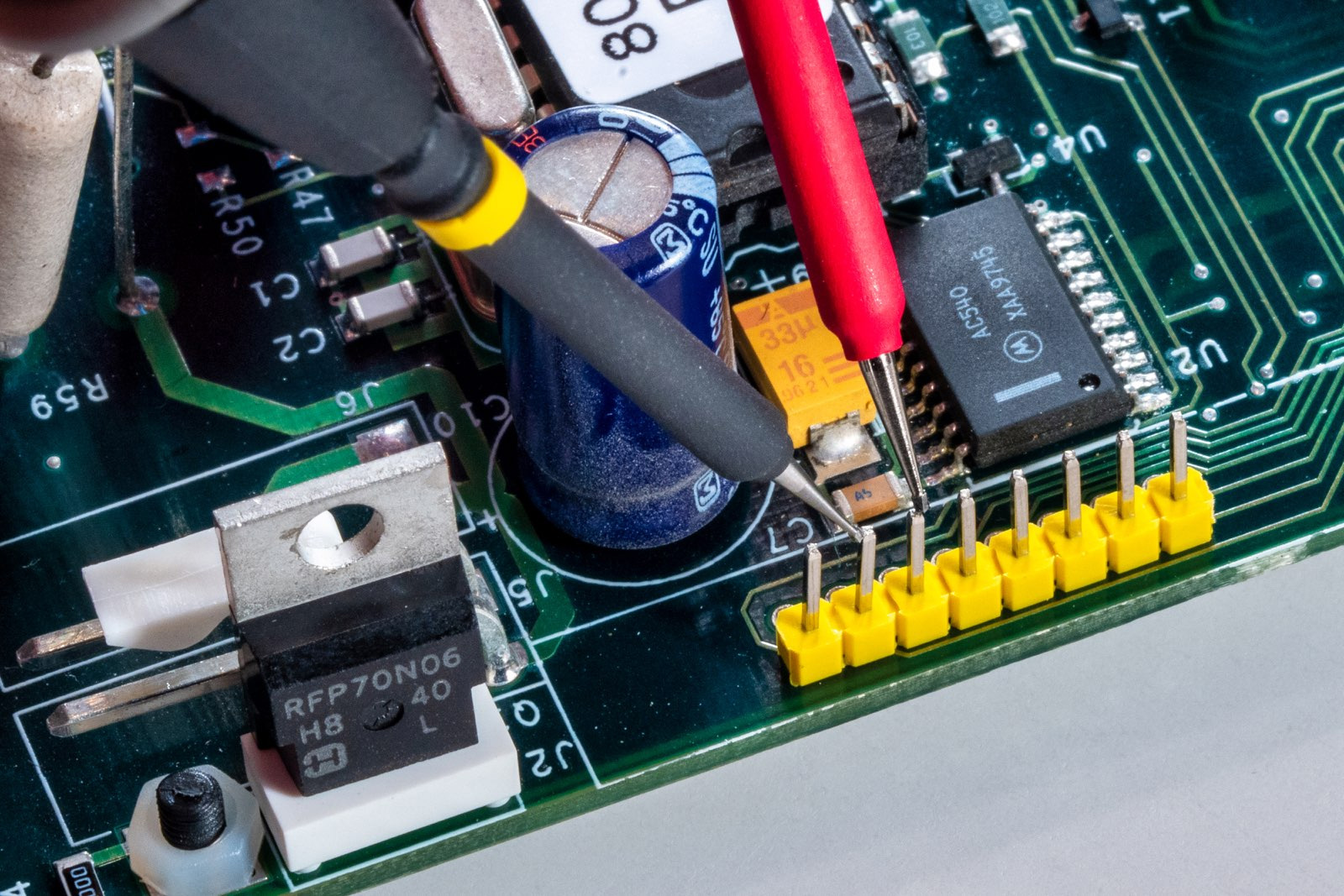 Nonslip DMM probe tips probing dense PCB a breeze TagConnect